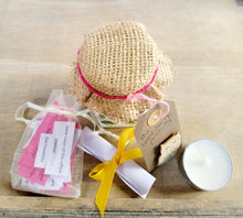 Load image into Gallery viewer, Hessian lid topped jar showing contents outside; pale organza bag with white/pink quotes, a white rolled up piece of paper tied with yellow ribbon and a white tealight candle.