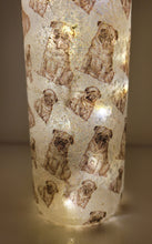 Load image into Gallery viewer, wine bottle decorated with tiny pug dog images. Lit up