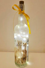 Load image into Gallery viewer, Decorative bottle with LED lights and Alpaca illustration, tied with a yellow ribbon.
