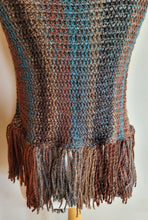 Load image into Gallery viewer, Brown and Blue Hand Knitted Striped Poncho - Knitted brown, blue poncho with round neck and long tassels, back view
