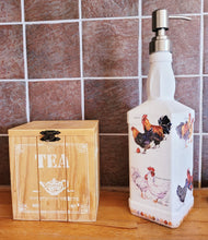 Load image into Gallery viewer, Jack daniels shaped bottle, painted white with chickens detailing around the sides, eggs around the edge at the bottom. Silver pump head
