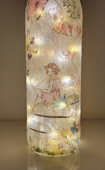 Decoupage Fairy bottle lamp - Lit up standard wine bottle with Fairy and flower butterfly detailing. Cork LED lights