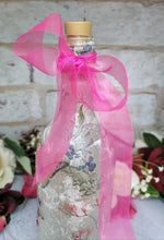Load image into Gallery viewer, Decoupage Fairy bottle lamp - Pink cerise organza ribbon, tied around the neck of a wine bottle, flower design on the side of the bottle
