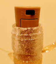 Load image into Gallery viewer, brown plastic cork with black switch in the top of a wine bottle
