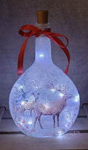 Load image into Gallery viewer, Decoupage Stag Light Up Bottle - Lit up Round glass bottle with Stag detailing. Red bow tied around the neck of the bottle, cork LED lights
