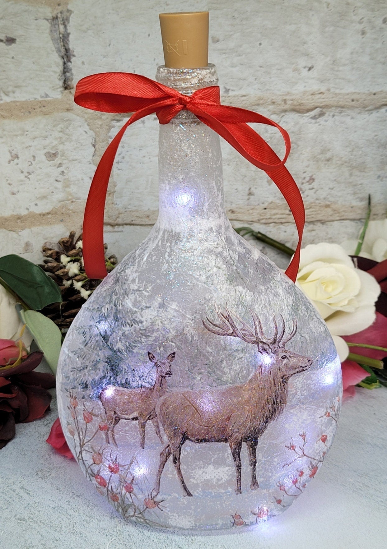 Decoupage Stag Light Up Bottle - Lit up Round glass bottle with Stag detailing. Red bow tied around the neck of the bottle, cork LED lights