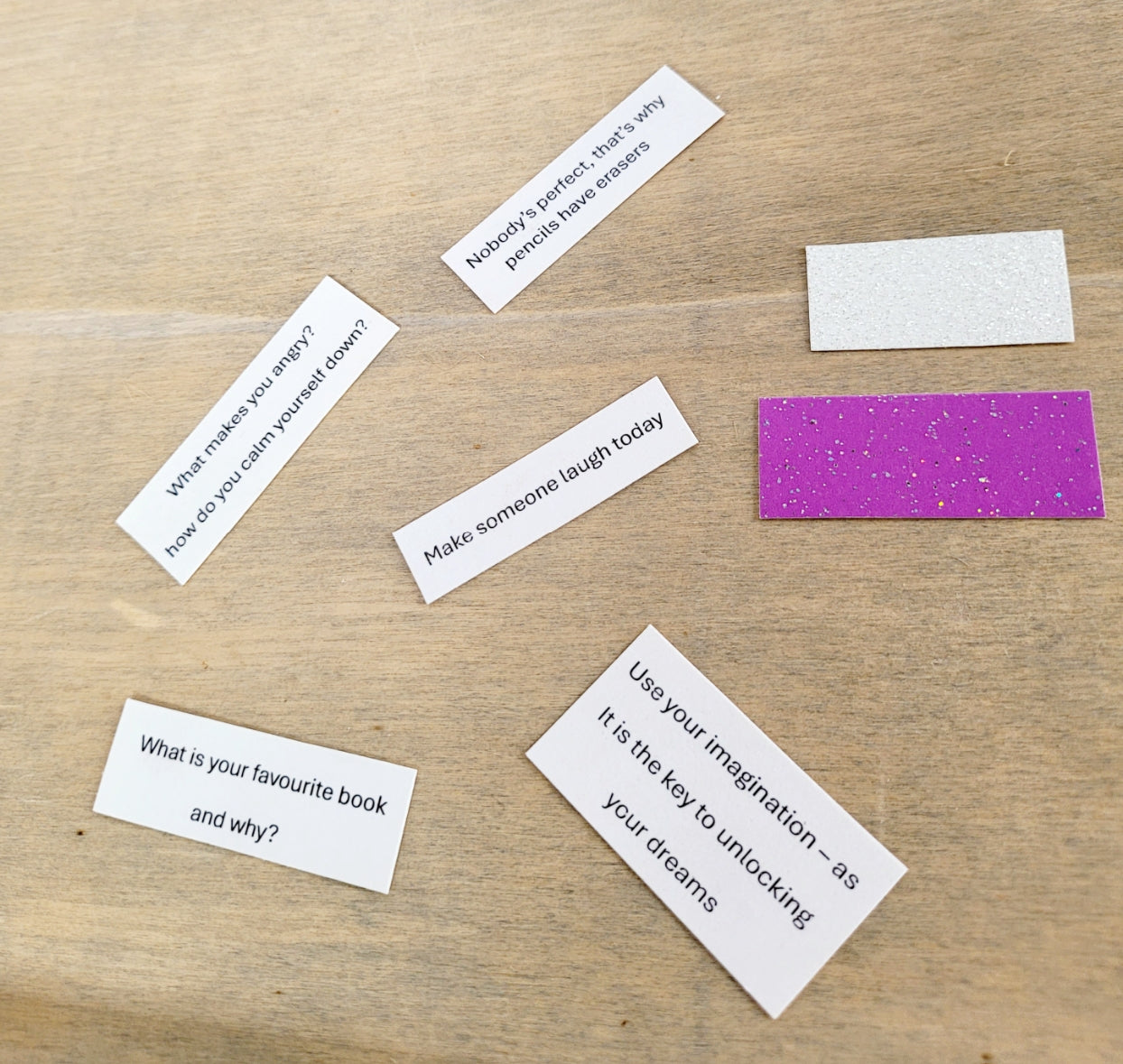 pink and white card with quotes on