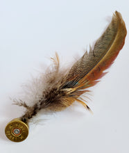 Load image into Gallery viewer, Pheasant feather hat pin, long pheasant tail feather with shorter feathers on the end of a brass gold coloured shotgun cartridge
