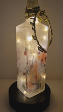Load and play video in Gallery viewer, Rotating Lit up square bottle with Fox Image. Jute string with leaves
