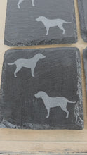 Load and play video in Gallery viewer, Four black slate coasters each with two labrador etched images on - dogs facing eachother
