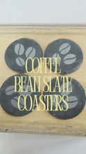 Load and play video in Gallery viewer, video of four black round slate coasters with coffee bean design
