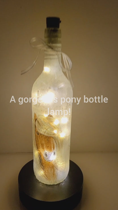 RLit up wine bottle with pony detail and white bowotating 