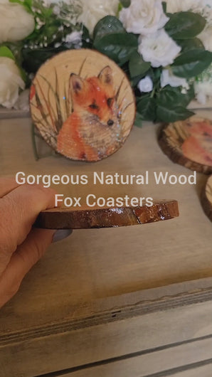 Four wood slice coasters, round with fox detail on each one. Varnished so look glossy.