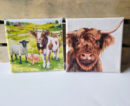 two farmyard animal decoupage  pictures set side by side. One is of a cow, sheep and pig in a meadow and the other, a highland cow