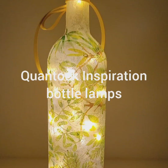 Rotating wine bottle with Giraffe detail. Yellow bow