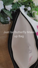 Load and play video in Gallery viewer, White make up bag with three pink Butterflies detail and inscription, &#39;Be you, Be true, Just be, black Zip
