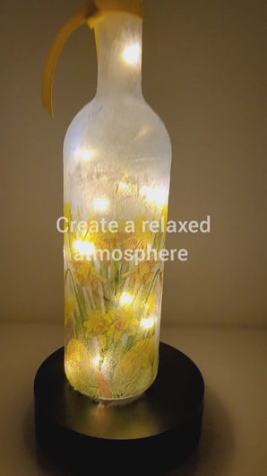 Rotating example of a Lit up wine bottle with Rabbit detail, cork lights and yellow bow